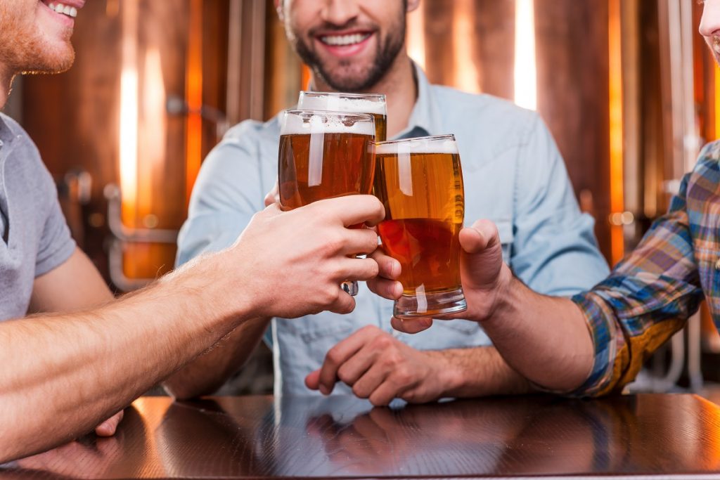 Friends drinking beer together